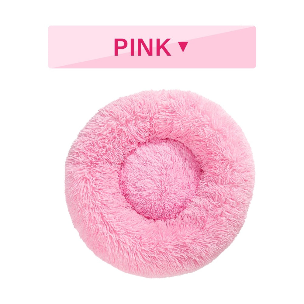 Soft, fluffy Tangled Trails outdoor gear donut dog bed with warm long plush cushion, ideal for cozy pet relaxation.