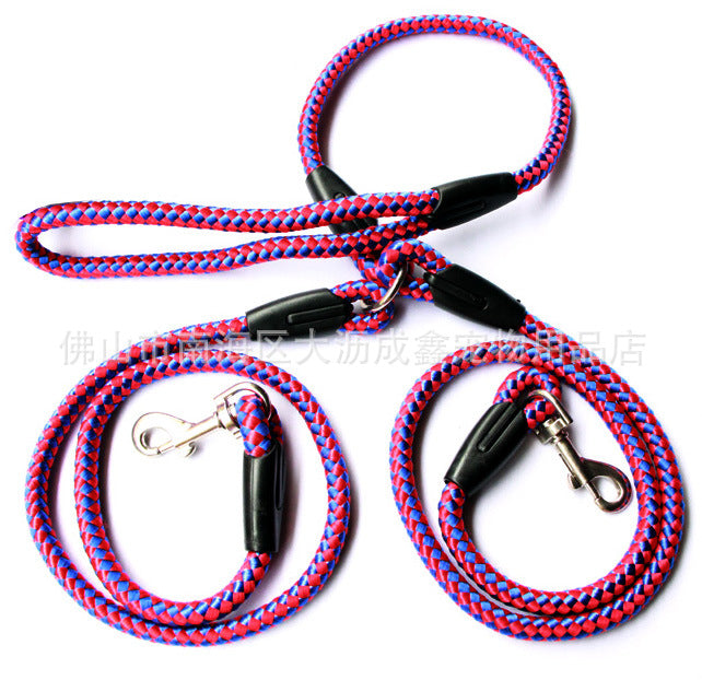 Double-ended dog traction rope by Tangled Trails Outdoor Gear for walking pets, showing durable nylon construction and ergonomic handles.