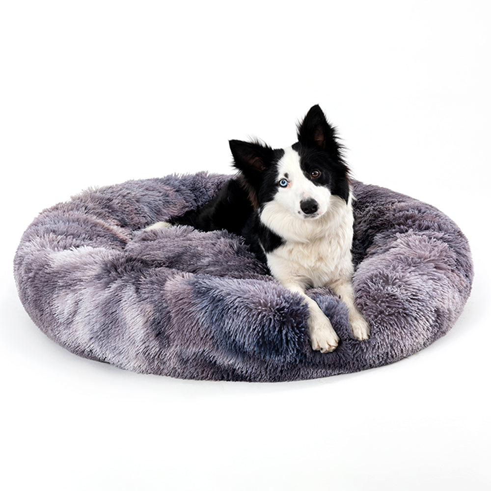 Soft plush Fluffy Donut Dog Bed by Tangled Trails Outdoor Gear, warm and cozy pet cushion with a cushioned, round design.