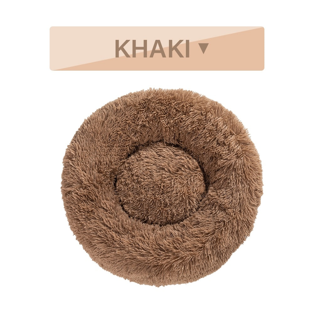 Soft fluffy donut dog bed by Tangled Trails Outdoor Gear with warm, long plush cushion for cozy pet comfort