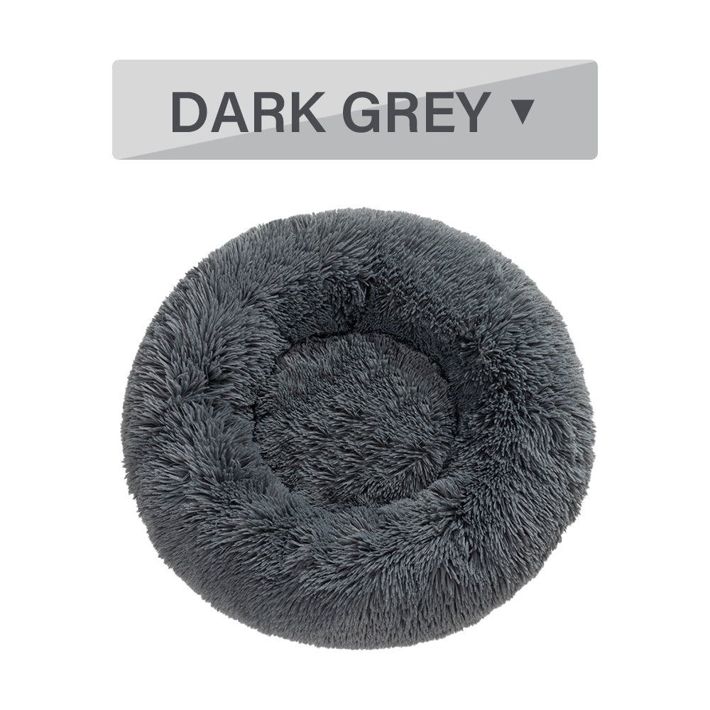 Soft, warm Fluffy Donut Dog Bed by Tangled Trails Outdoor Gear with long plush cushions for cozy pet comfort.
