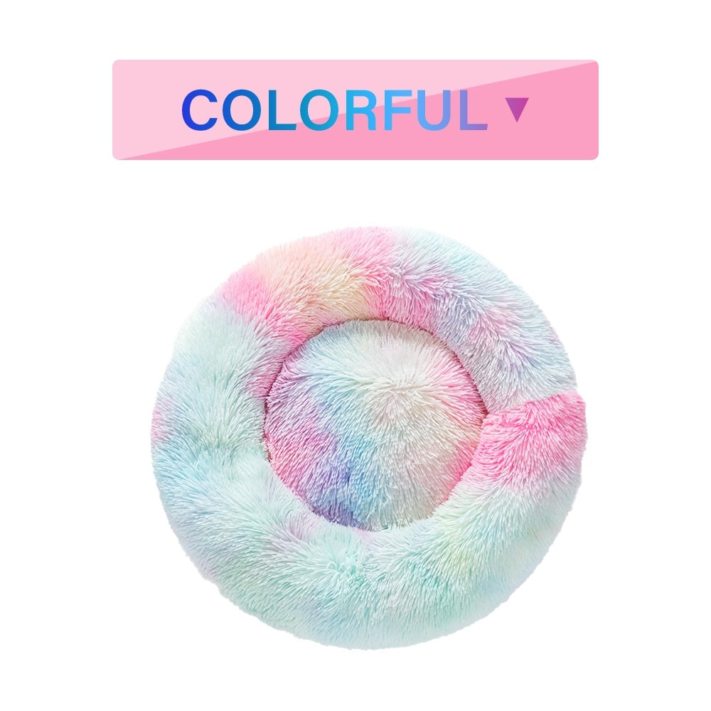 Soft, fluffy donut dog bed by Tangled Trails Outdoor Gear with warm, long plush fabric, perfect for cozy pet relaxation.